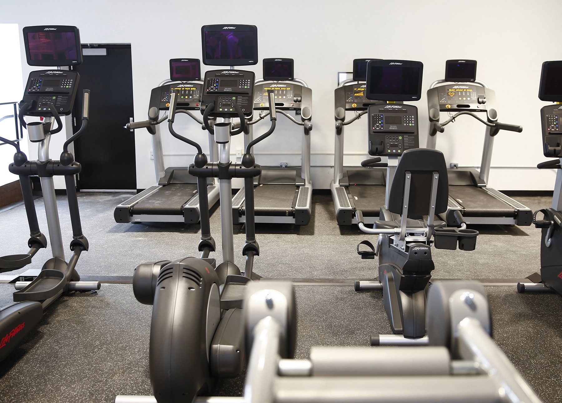 Empty gym with exercise equipment
