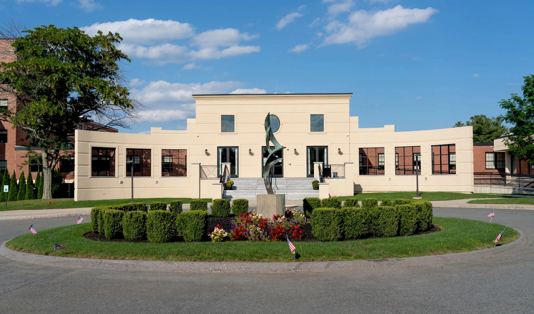 Modern building with landscaped garden.