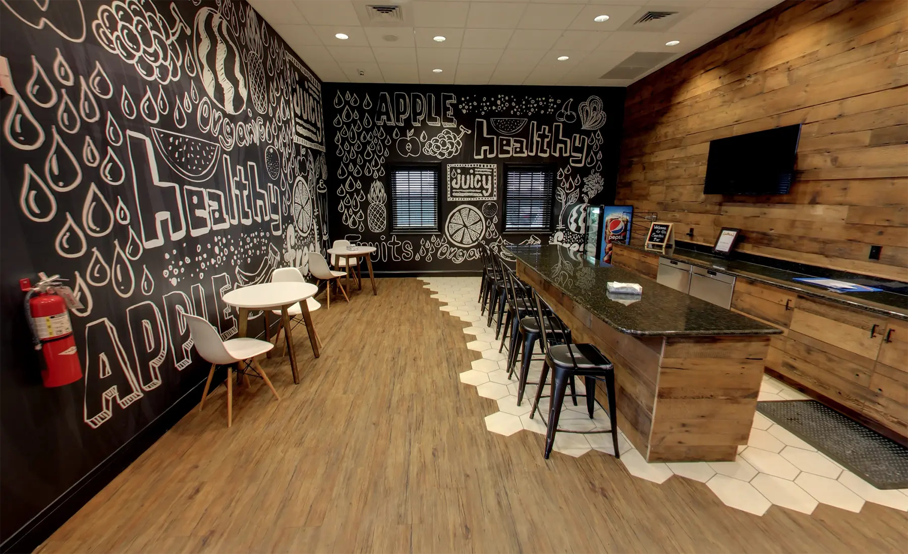 Modern cafe with artistic wall design