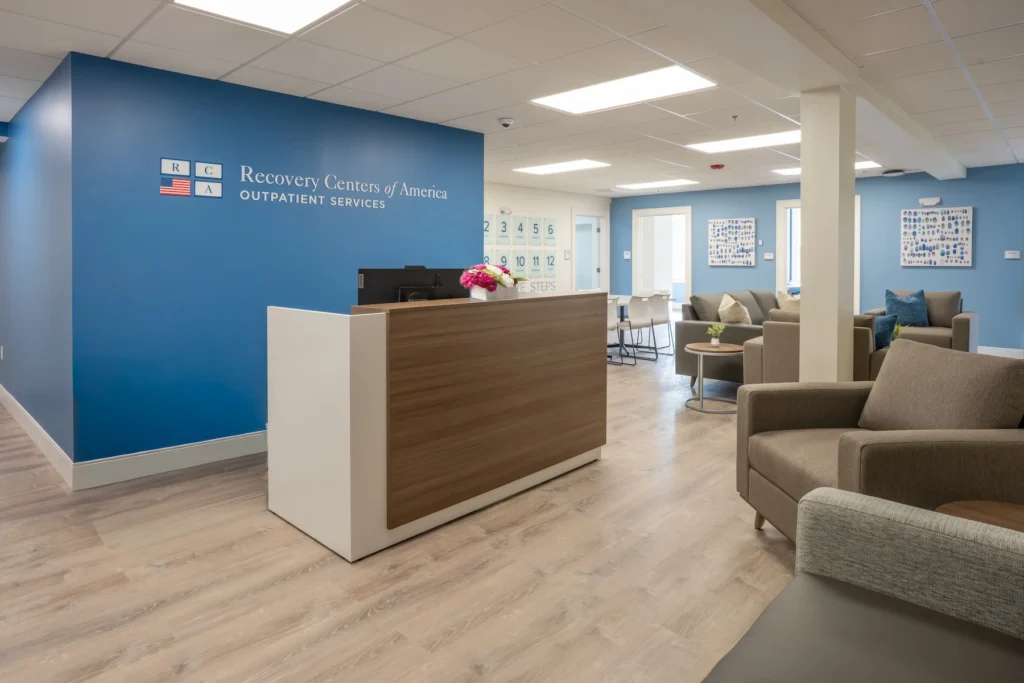 Reception desk and patient lounge at Recovery Centers of America Outpatient Services in Worcester